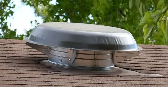 attic fan installation services with low-profile roof ventilation unit in Columbia, MO