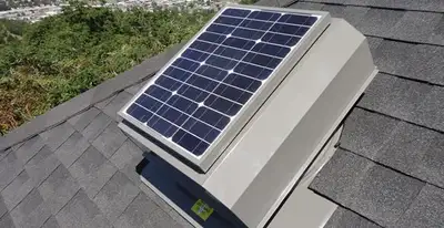 attic fan installation services with energy-efficient roof-mounted ventilation system in Columbia, MO