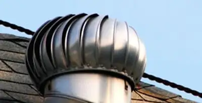 attic fan installation services with professionally installed roof ventilation unit in Columbia, MO