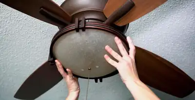 Ceiling fan repair and reinstallation on ceiling mount in Columbia, MO