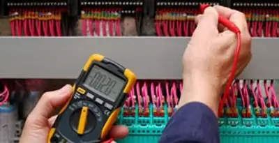 electrical service showing professional testing and troubleshooting of electrical panel by licensed electricians in Columbia, MO