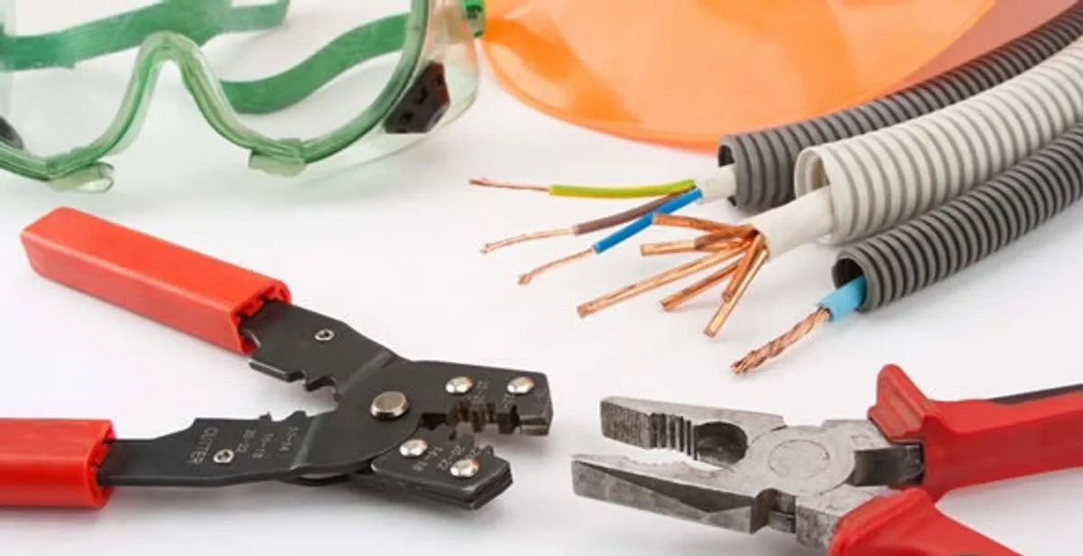 Electrical wiring repair with professional tools and safety equipment in Harrisburg, MO