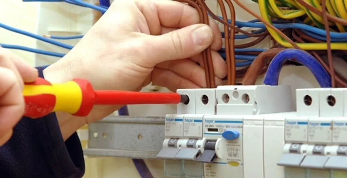 electrician services performing professional electrical panel wiring and connections in Columbia, MO
