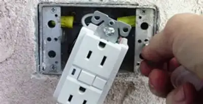 gfci circuits service showing installation of a ground fault circuit interrupter outlet by licensed electricians in Columbia, MO