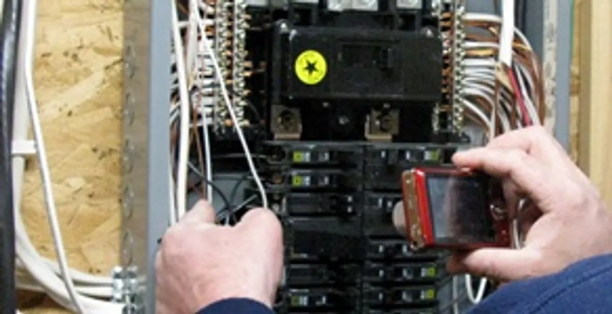 Home electrical inspection of circuit breaker panel by licensed electrician in Columbia, MO