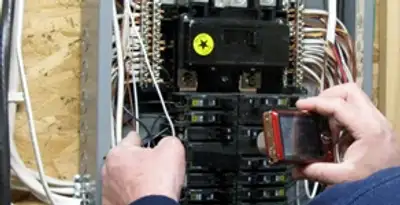 Home electrical inspection of circuit breaker panel by licensed electrician in Columbia, MO