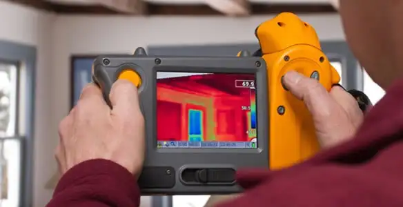 home energy audit service capturing thermal readings to analyze insulation and electrical efficiency in Columbia, MO