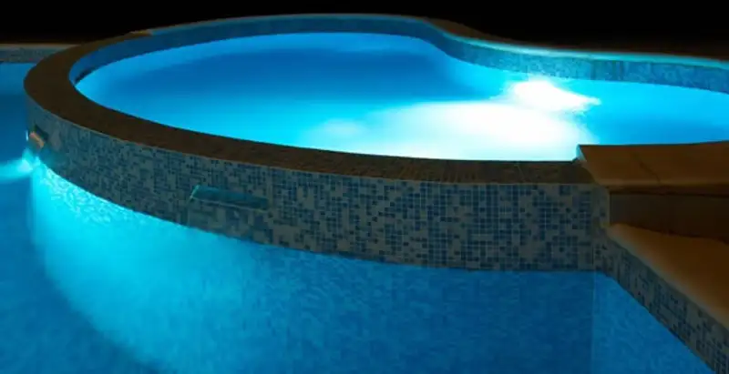 pool light installation and repair services highlighting illuminated pool interior lighting in Columbia, MO