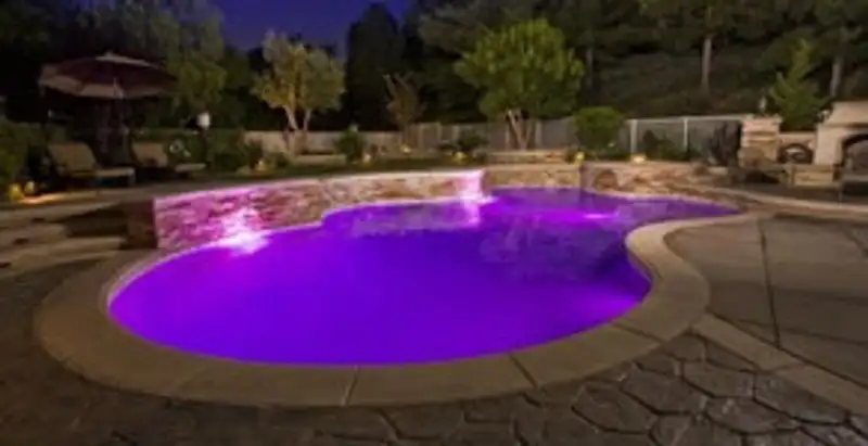 pool light installation and repair services illuminating a residential swimming pool in Columbia, MO