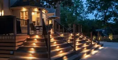 Residential electrician installing outdoor lighting for home safety in Columbia, MO
