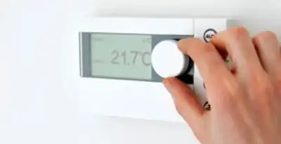 Thermostat installation service with professional adjusting temperature control in Columbia, MO